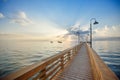 Wooden pier and boardwalk over ocean Royalty Free Stock Photo