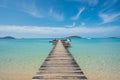 Wooden pier with boat in Phuket, Thailand. Summer, Travel, Vacation and Holiday concept. Royalty Free Stock Photo