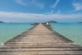 Wooden pier with boat in Phuket, Thailand. Summer, Travel, Vacation and Holiday concept. Royalty Free Stock Photo