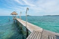 Wooden pier with boat in Phuket, Thailand. Summer, Travel, Vacation and Holiday concept Royalty Free Stock Photo