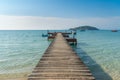 Wooden pier with boat in Phuket, Thailand. Summer, Travel, Vacation and Holiday concept Royalty Free Stock Photo