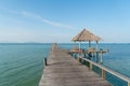 Wooden pier with boat in Phuket, Thailand. Summer, Travel, Vacation and Holiday concept Royalty Free Stock Photo