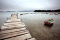 Wooden pier and boats Royalty Free Stock Photo