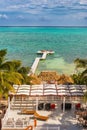 Wooden pier dock and ocean view at Caye Caulker Belize Caribbean Royalty Free Stock Photo