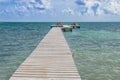 Wooden pier dock and ocean view at Caye Caulker Belize Caribbean Royalty Free Stock Photo