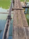 Wooden pier beside drainage canal