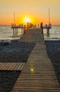 Wooden pier entering into the sea Royalty Free Stock Photo