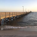 A pier extends into the sea Royalty Free Stock Photo