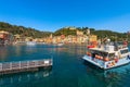 Wooden Pier and a Fishing Boat in the Port of Portofino - Liguria Italy Royalty Free Stock Photo