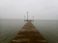 Wooden Pier on Foggy Day Royalty Free Stock Photo