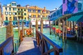 Grand canal wooden pier Rialto bridge Venice Italy Royalty Free Stock Photo