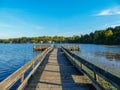 Wooden pier on a lake in fall - Michigan Royalty Free Stock Photo