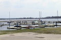 Wooden pier of the lake in the foreground. Moored yachts Royalty Free Stock Photo