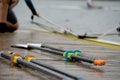 Wooden pier on a lake shoreline with oars resting against the side of the dock Royalty Free Stock Photo