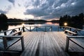 Wooden pier with lanterns leaving the lake Royalty Free Stock Photo