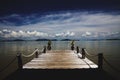 Wooden pier leading in the Andaman sea on tropical island Ko Lanta, Thailand