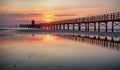 Wooden pier leading to a red lighthouse at sunrise in Lignano Sabbiadoro, Friuli, Italy - beach