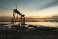 Wooden pier over magical light during sunset background.muddy beach and soft cloud Royalty Free Stock Photo