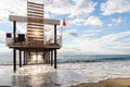 Wooden pier over the sea shore. Blue sky with clouds on sunny day Royalty Free Stock Photo