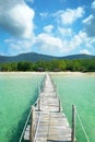 Wooden Pier over sea in a tropical island Royalty Free Stock Photo