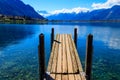 Wooden pier overlooking the Alps and Lake Geneva, Switzerland Royalty Free Stock Photo