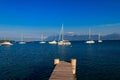 Wooden pier overlooking the Alps and Lake Geneva, Switzerland Royalty Free Stock Photo