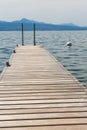 Wooden pier overlooking the Alps and Lake Geneva, Switzerland Royalty Free Stock Photo