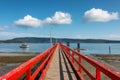 Wooden Pier by the Pacific Ocean West Coast.