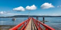 Wooden Pier by the Pacific Ocean West Coast.