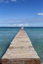 A wooden pier at Playa de Muro beach in Mallorca Royalty Free Stock Photo