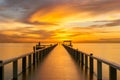 Wooden pier between sunset in Phuket, Thailand. Royalty Free Stock Photo