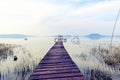 Wooden pier in tranquil lake Balaton Royalty Free Stock Photo