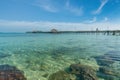 Wooden pier with tropical hut at resort in Phuket, Thailand. Sum Royalty Free Stock Photo