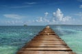 Wooden pier in tropical sea Royalty Free Stock Photo