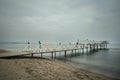 Wooden pier and white aluminum railing on Tekirdag beach