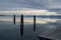 Wooden Pillars Reflecting in Lake Champlain in Burlington, Vermont, USA Royalty Free Stock Photo