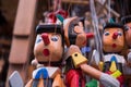 Wooden pinocchio dolls with his long nose Royalty Free Stock Photo