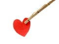 Wooden pins pinch red heart Royalty Free Stock Photo