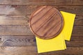 Wooden pizza desk and yellow tableclothes on table, food concept,mock up Royalty Free Stock Photo