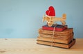 Wooden plane with heart on the stack of old books Royalty Free Stock Photo