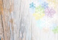 Wooden plank background with colorful snowflake Royalty Free Stock Photo