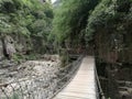 Wooden plank bridge in the canyon Royalty Free Stock Photo