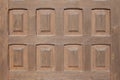 Wooden plank with 8 carved rectangles. middle plan of an antique european style door