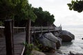 Wooden plank dock around cliff cape