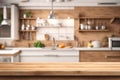 Wooden plank over a blurred kitchen background for product's display