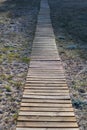 wooden plank path on sand beach Royalty Free Stock Photo