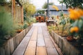 wooden plank pathway through a garden Royalty Free Stock Photo