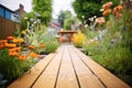 wooden plank pathway through a garden Royalty Free Stock Photo