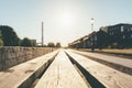 Wooden planks with countryside background at sunrise