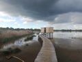 Wooden planks form a way over the water to the viewpiont Royalty Free Stock Photo